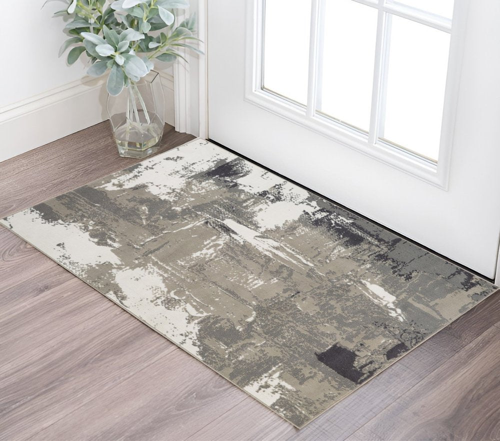 8' X 10' Ivory Black and Gray Abstract Power Loom Area Rug