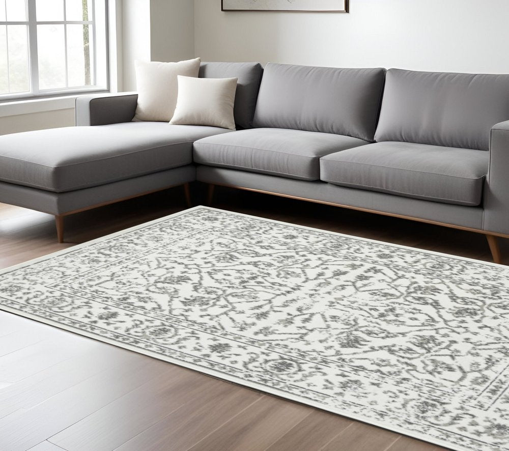 10' X 14' Ivory And Gray Floral Area Rug