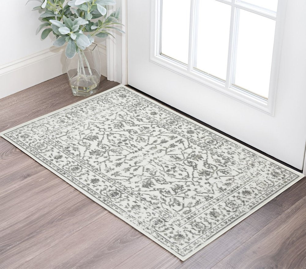 10' X 14' Ivory And Gray Floral Area Rug