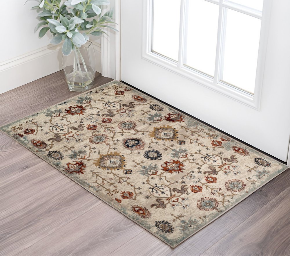 5' X 8' Beige Rust and Navy Oriental Power Loom Area Rug