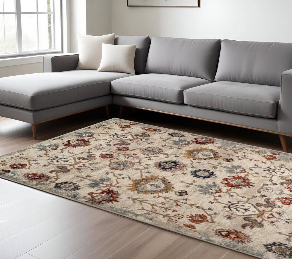 5' X 8' Beige Rust and Navy Oriental Power Loom Area Rug