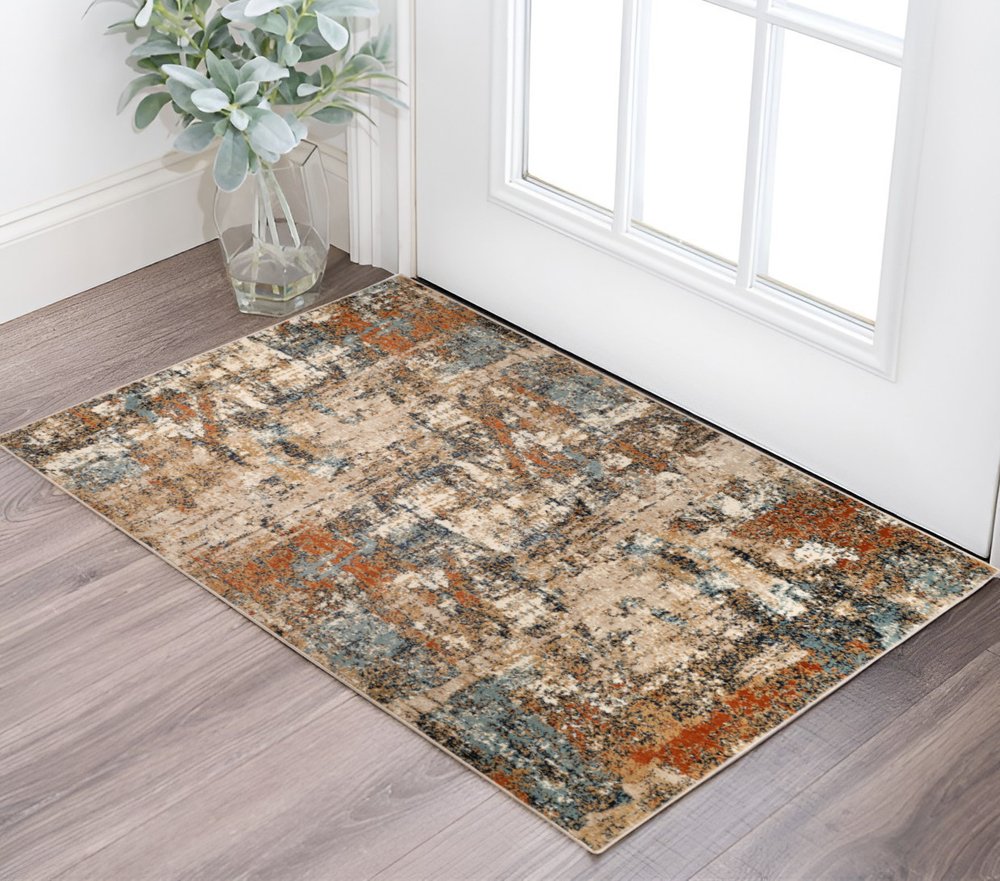 5' X 8' Tan Orange and Gray Abstract Power Loom Area Rug