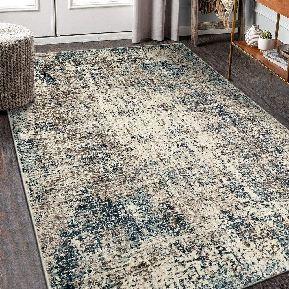9' X 12' Ivory Blue and Gray Abstract Power Loom Area Rug