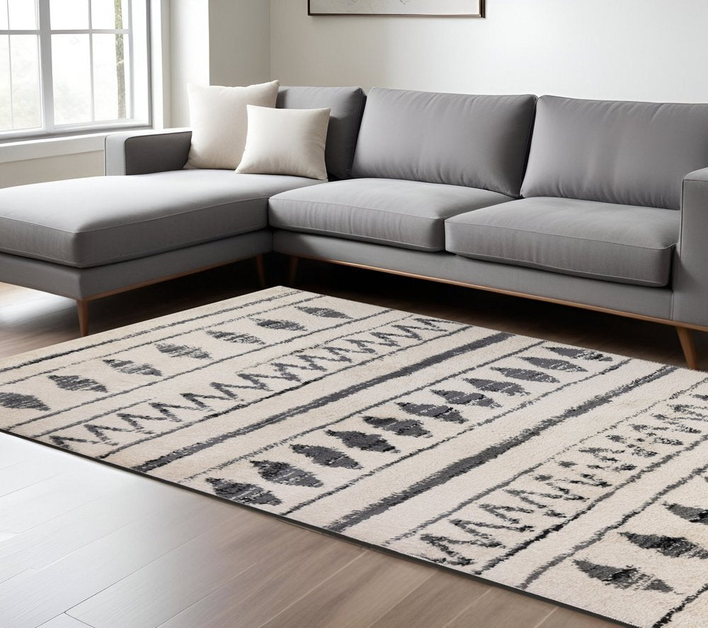 10' Cream Black And Gray Geometric Shag Runner Rug