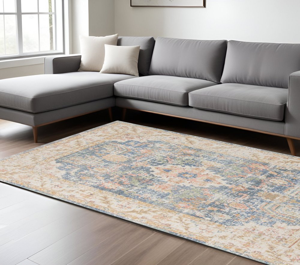 5' X 8' Coral And Blue Floral Area Rug