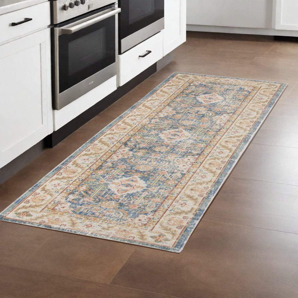 5' X 8' Coral And Blue Floral Area Rug