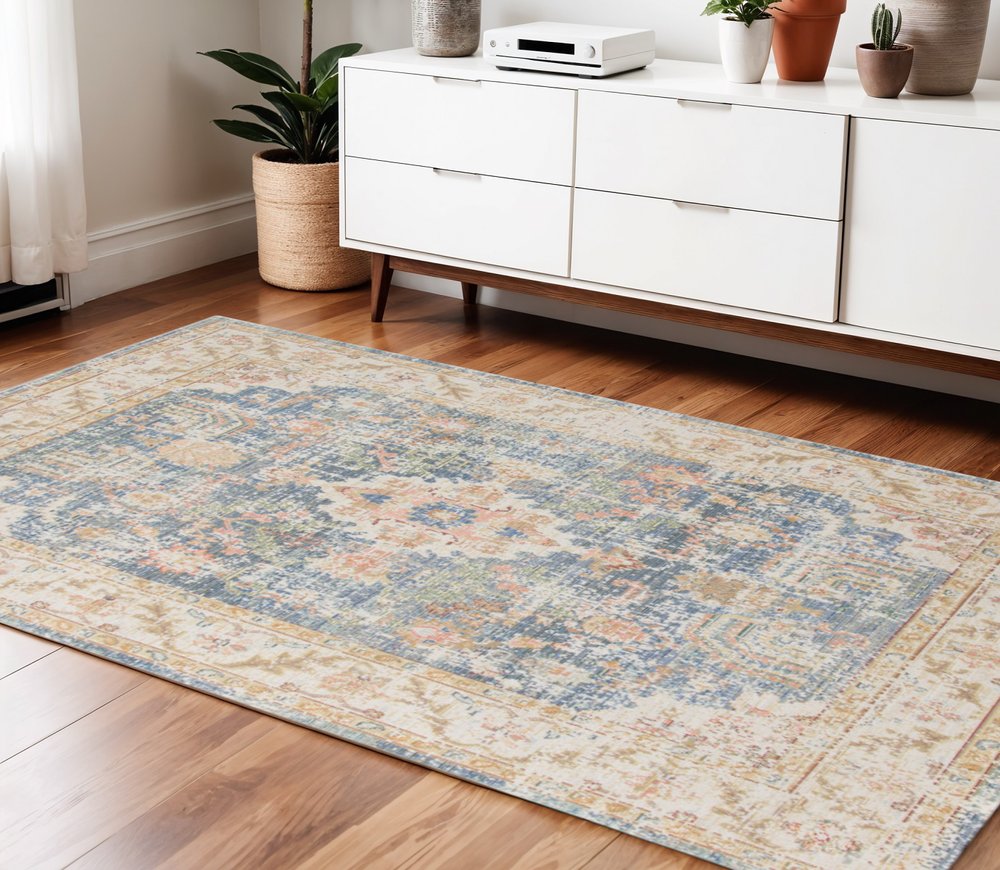 5' X 8' Coral And Blue Floral Area Rug