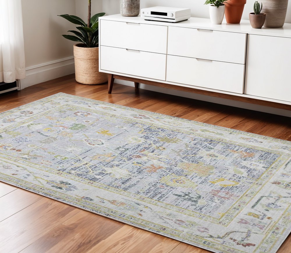 9' X 13' Ivory Blue And Green Floral Area Rug