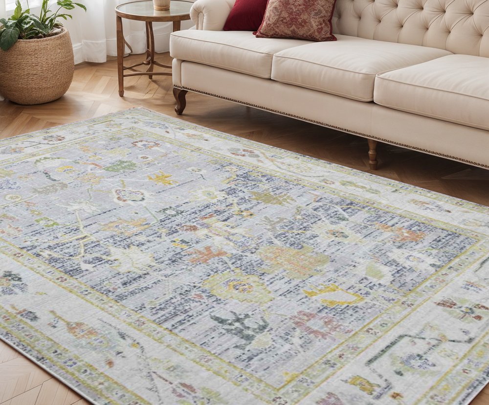 9' X 13' Ivory Blue And Green Floral Area Rug