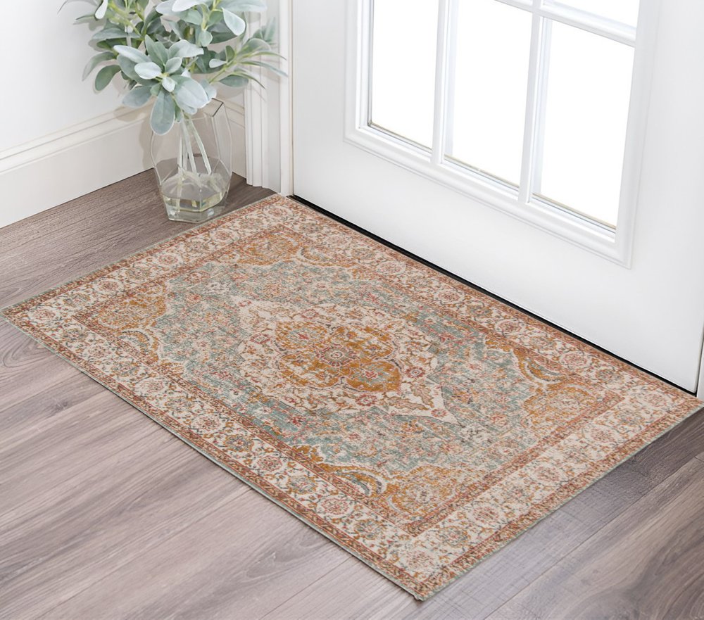 5' X 8' Orange Light Blue And Beige Oriental Area Rug