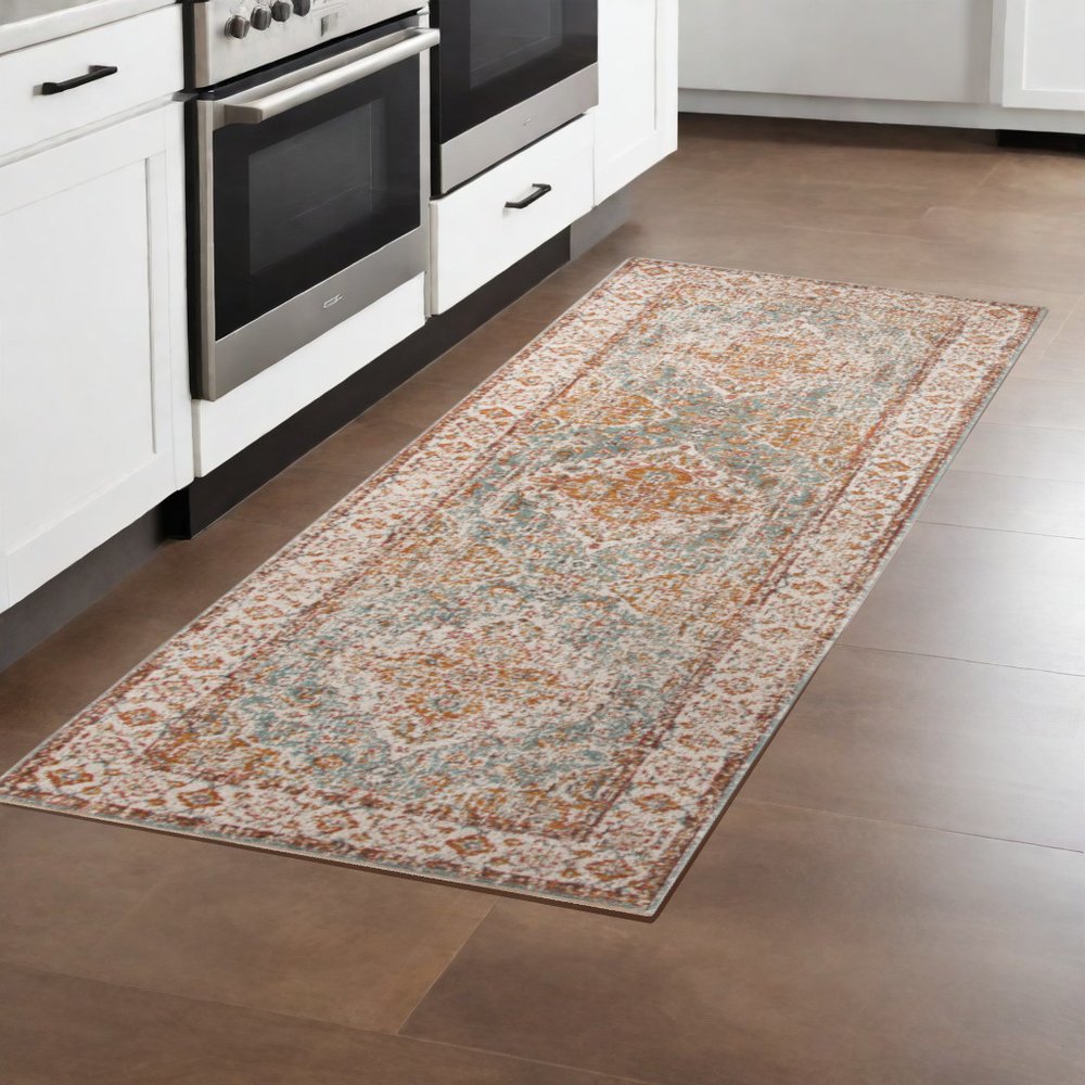 5' X 8' Orange Light Blue And Beige Oriental Area Rug