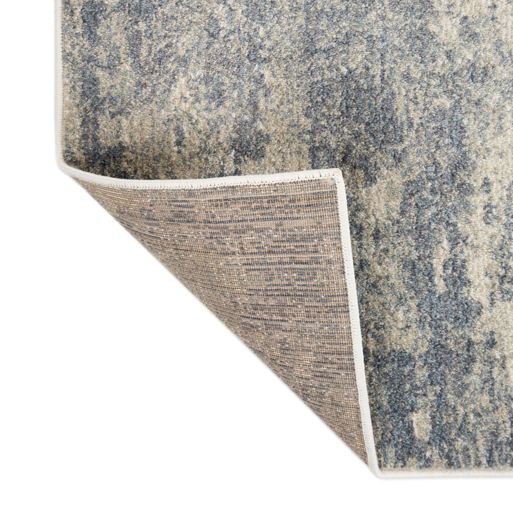 6' X 9' Light Gray Blue And Ivory Abstract Area Rug