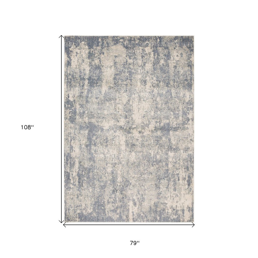 6' X 9' Light Gray Blue And Ivory Abstract Area Rug