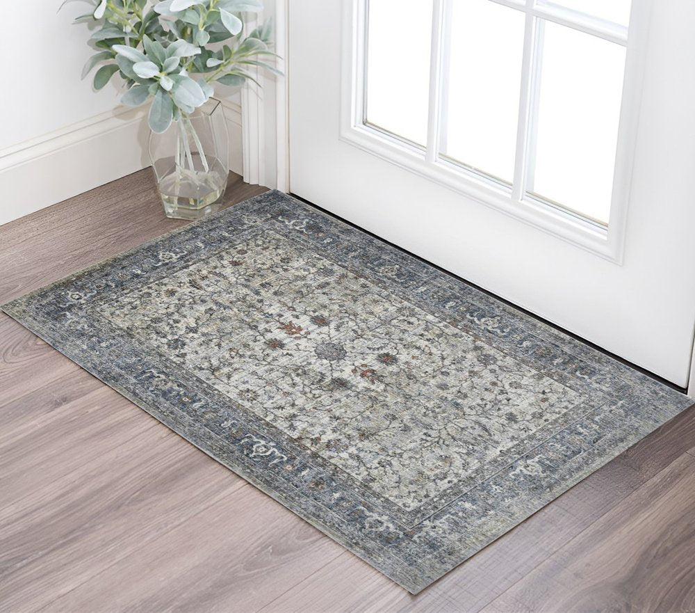 5' X 8' Ivory Blue And Gray Oriental Area Rug
