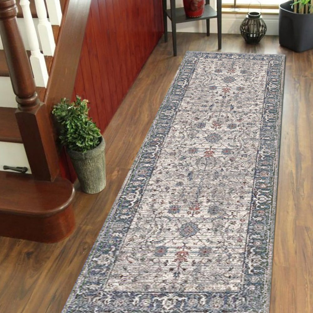 5' X 8' Ivory Blue And Gray Oriental Area Rug