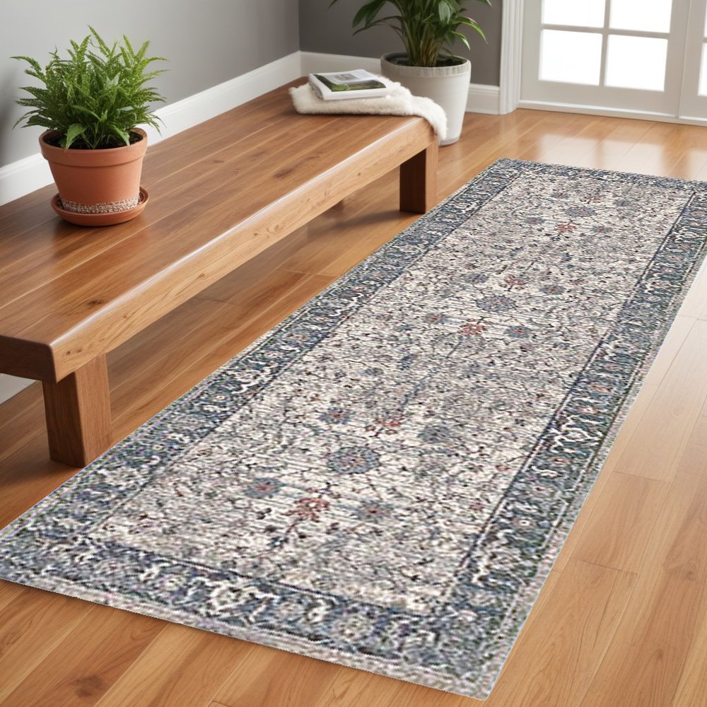 5' X 8' Ivory Blue And Gray Oriental Area Rug