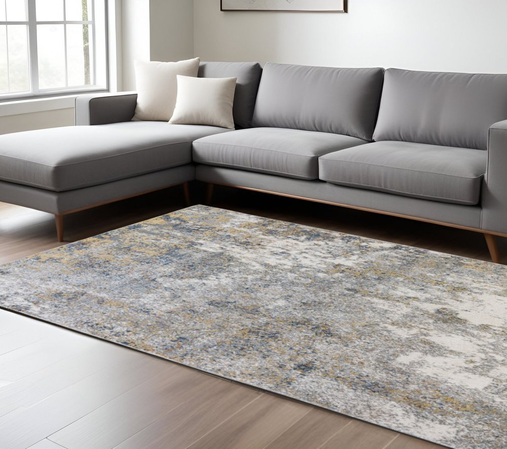5' X 8' Ivory Blue And Yellow Abstract Area Rug