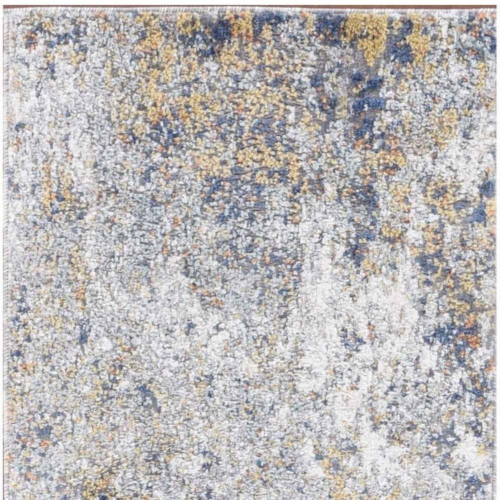 5' X 8' Ivory Blue And Yellow Abstract Area Rug