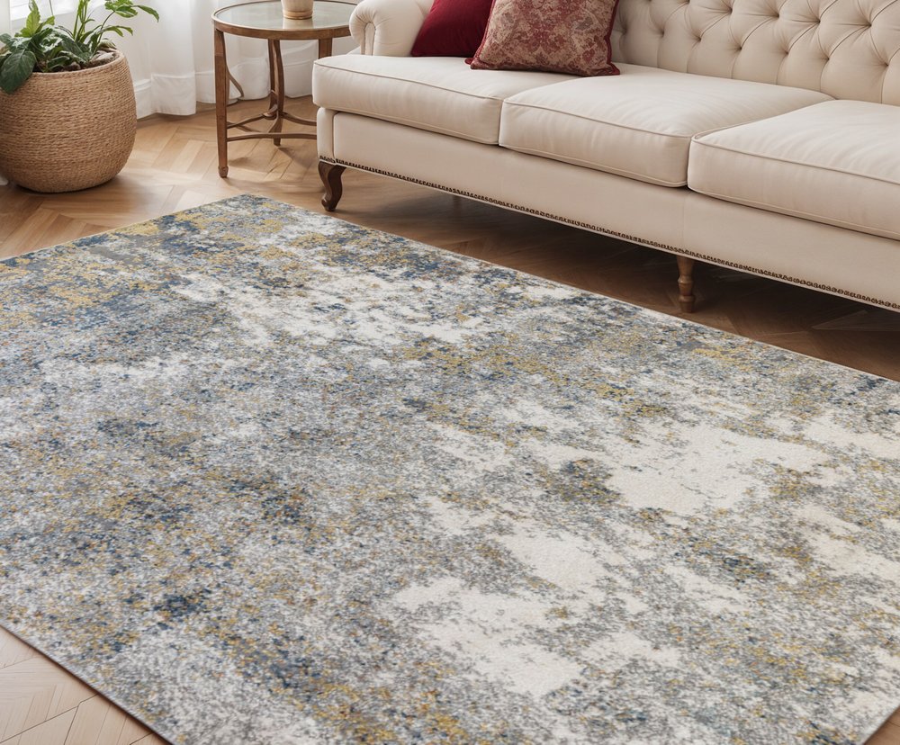 5' X 8' Ivory Blue And Yellow Abstract Area Rug