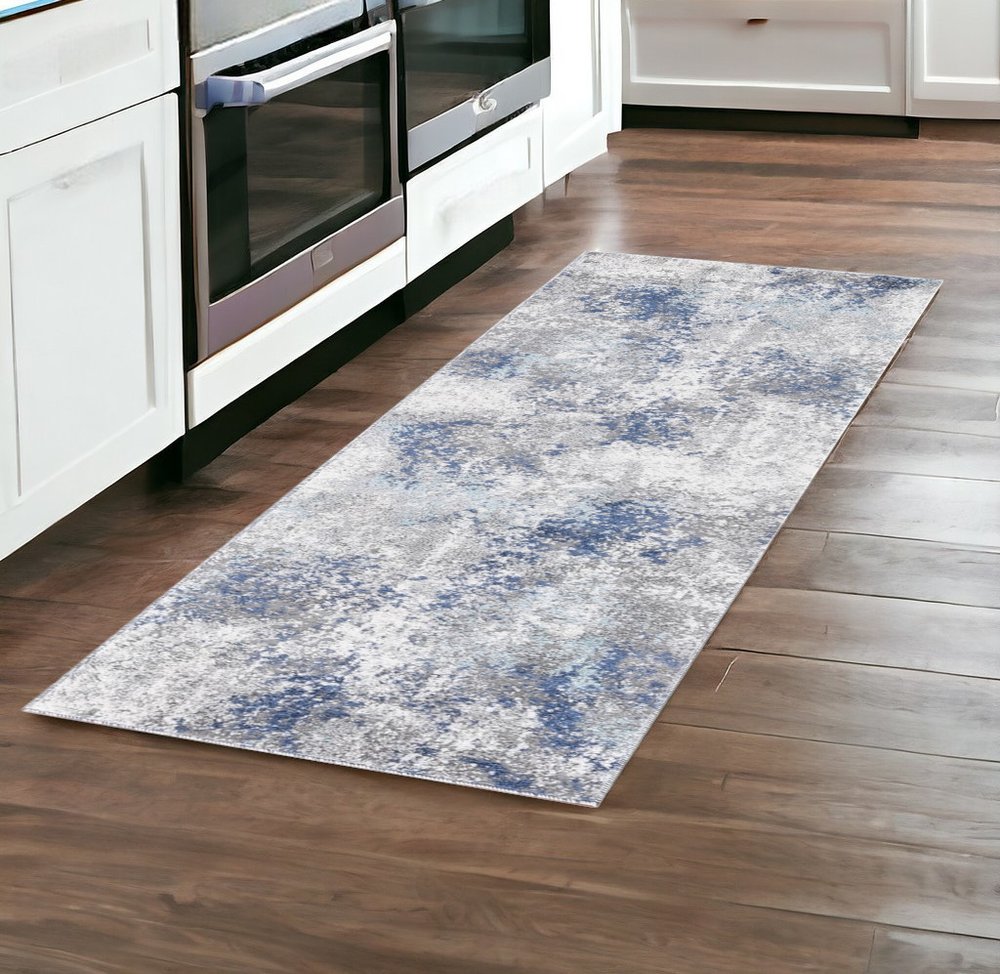 9' X 12' Ivory Blue And Gray Abstract Area Rug