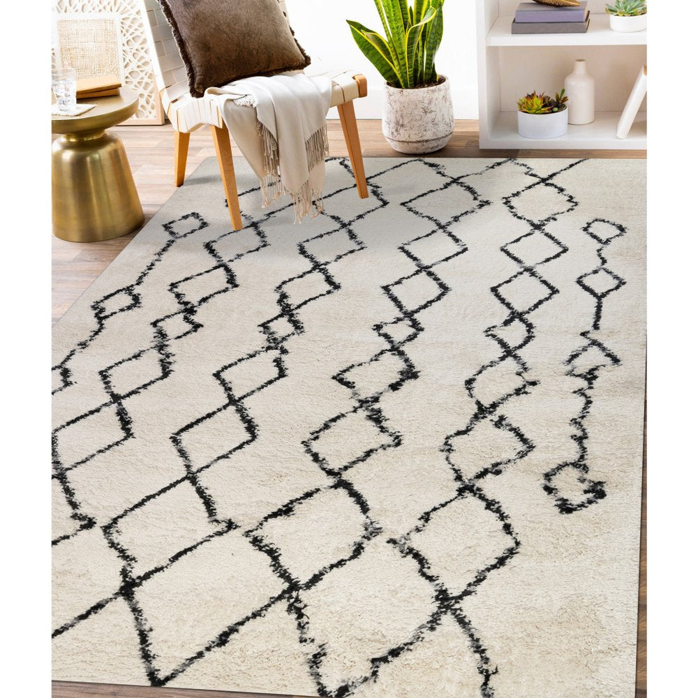 5' X 8' Ivory And Black Geometric Shag Area Rug