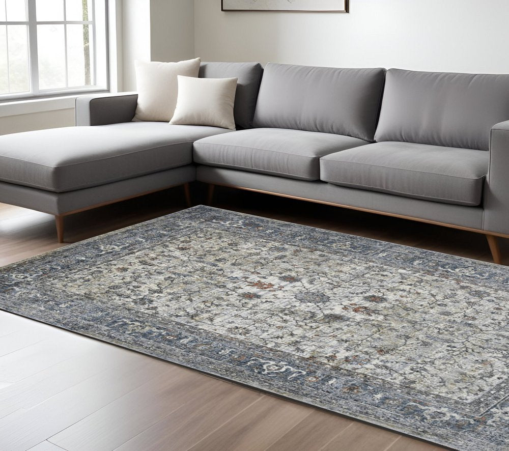 9' X 12' Ivory Blue And Gray Oriental Area Rug