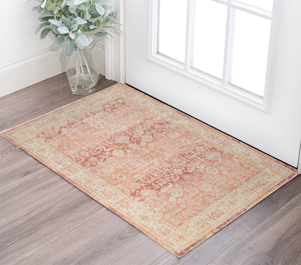 2' X 3' Salmon And Tan Floral Distressed Area Rug