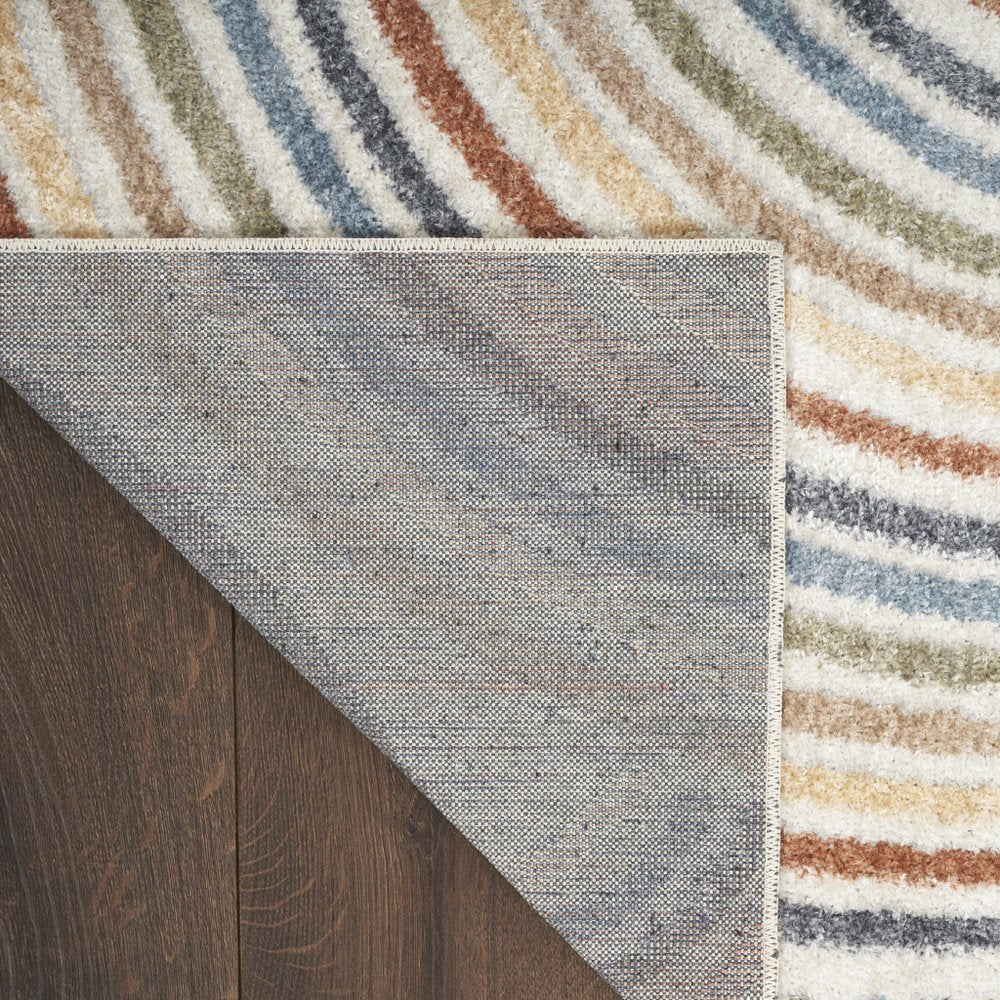 3' X 5' Blue and Ivory Abstract Power Loom Washable Area Rug