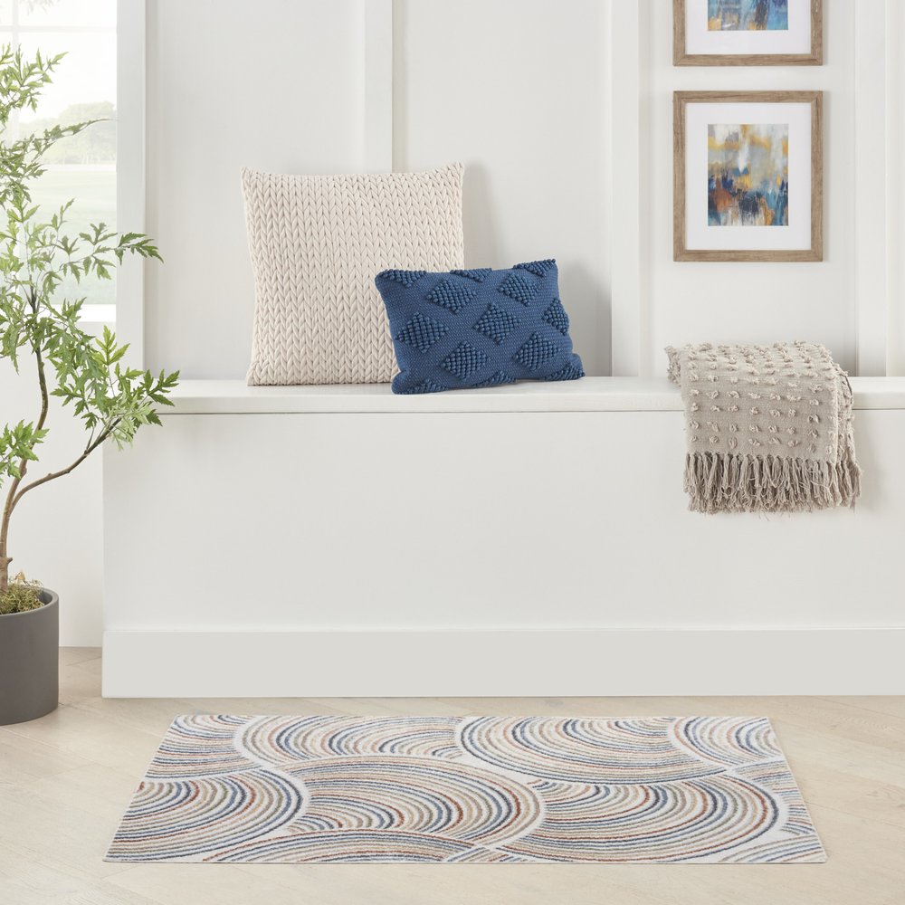 3' X 5' Blue and Ivory Abstract Power Loom Washable Area Rug