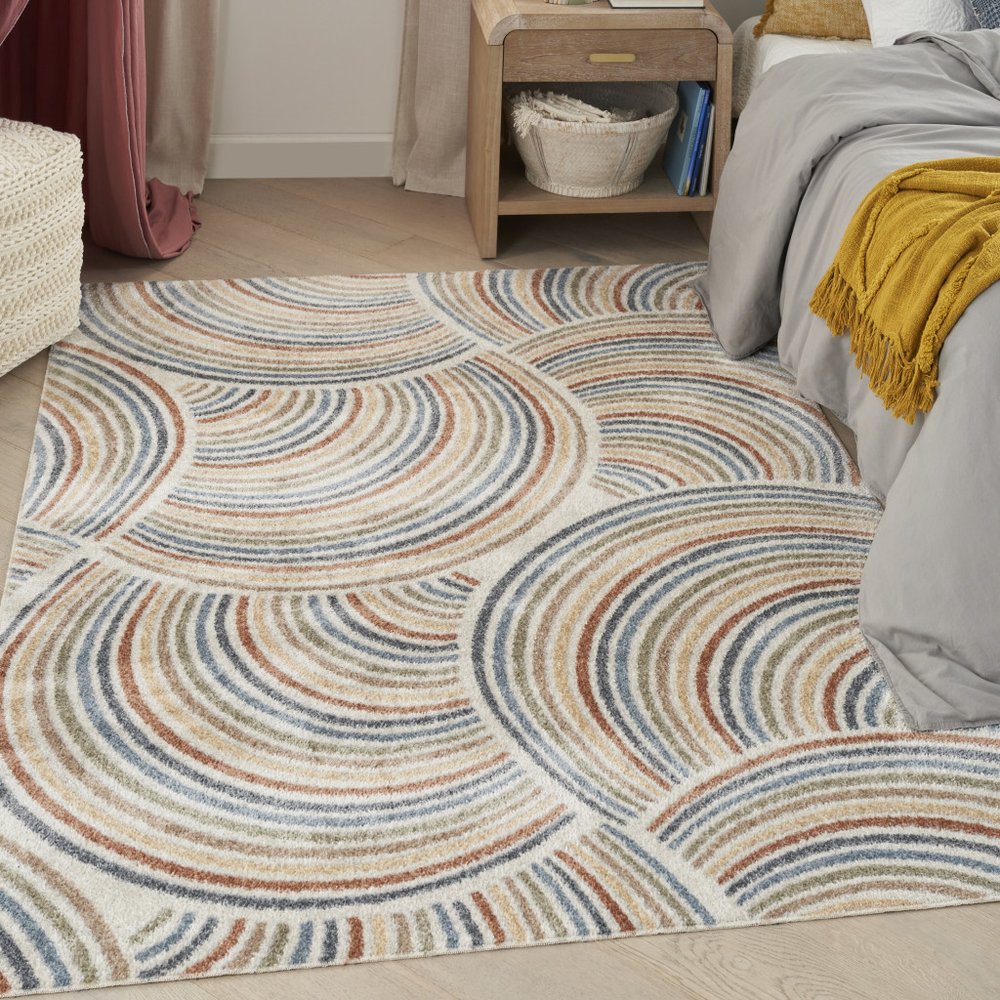 4' X 6' Blue and Ivory Abstract Power Loom Washable Area Rug