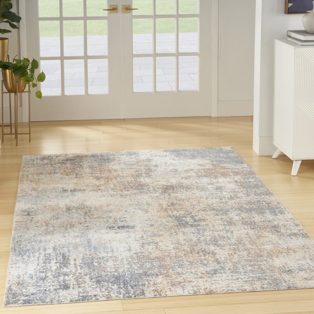 5' X 7' Blue And Ivory Abstract Washable Area Rug