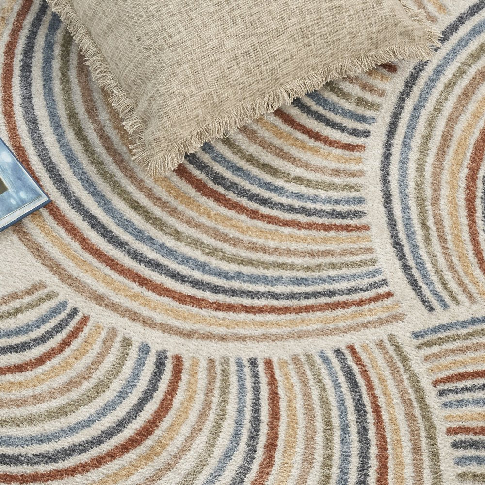 5' X 7' Blue and Ivory Abstract Power Loom Washable Area Rug