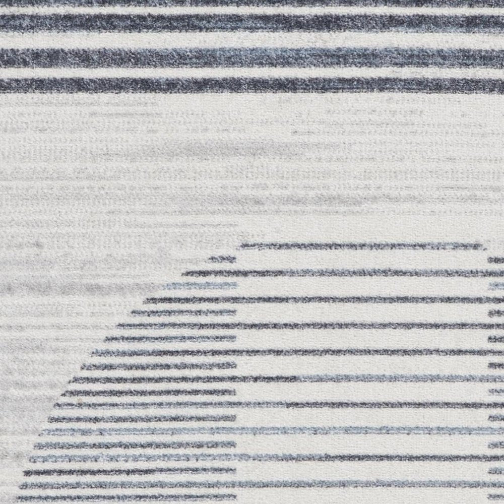 3' X 5' Blue and Ivory Geometric Power Loom Washable Area Rug