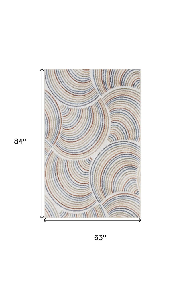 5' X 7' Blue and Ivory Geometric Power Loom Washable Area Rug