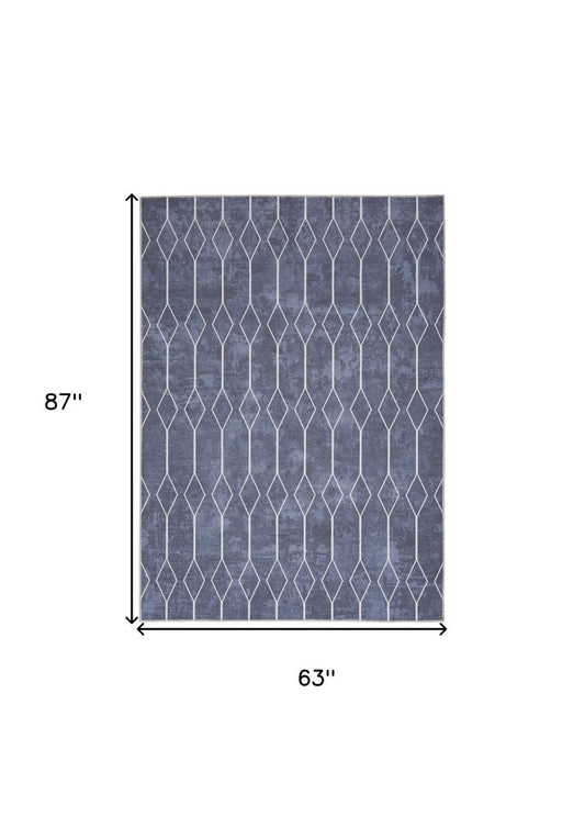 5' X 7' Blue and Ivory Geometric Power Loom Washable Area Rug