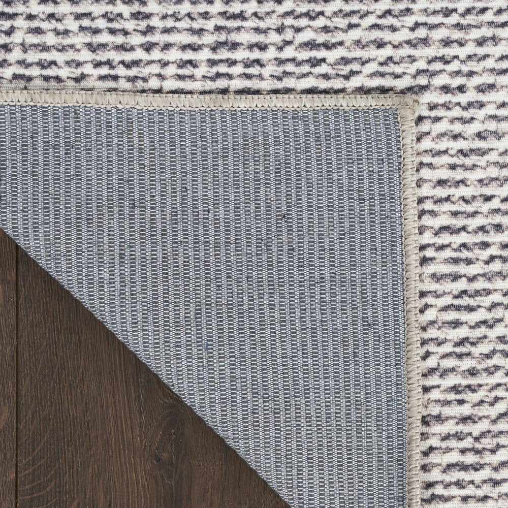 6' X 9' Gray and Ivory Abstract Power Loom Washable Non Skid Area Rug