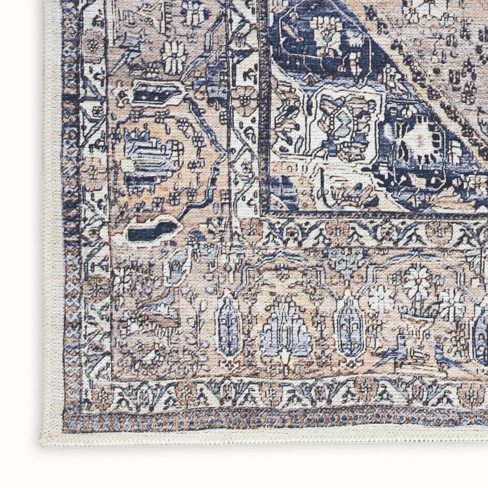 5' X 7' Ivory and Blue Oriental Power Loom Distressed Washable Non Skid Area Rug