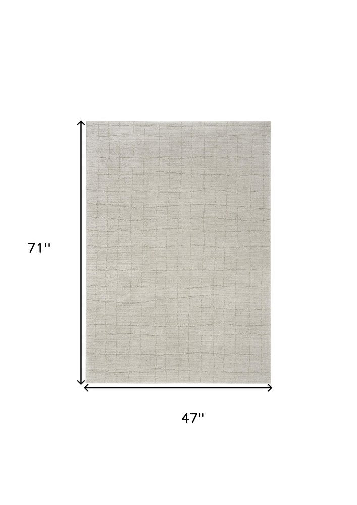 4' X 6' Beige and Gray Abstract Power Loom Area Rug