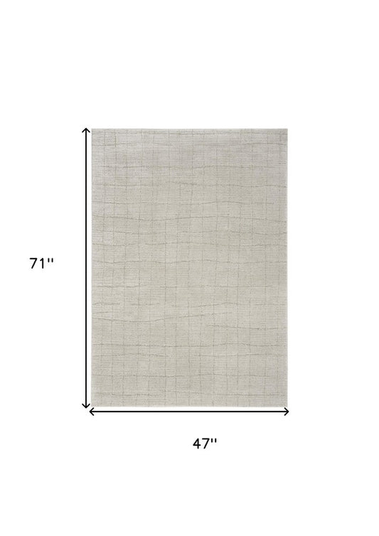 4' X 6' Beige and Gray Abstract Power Loom Area Rug