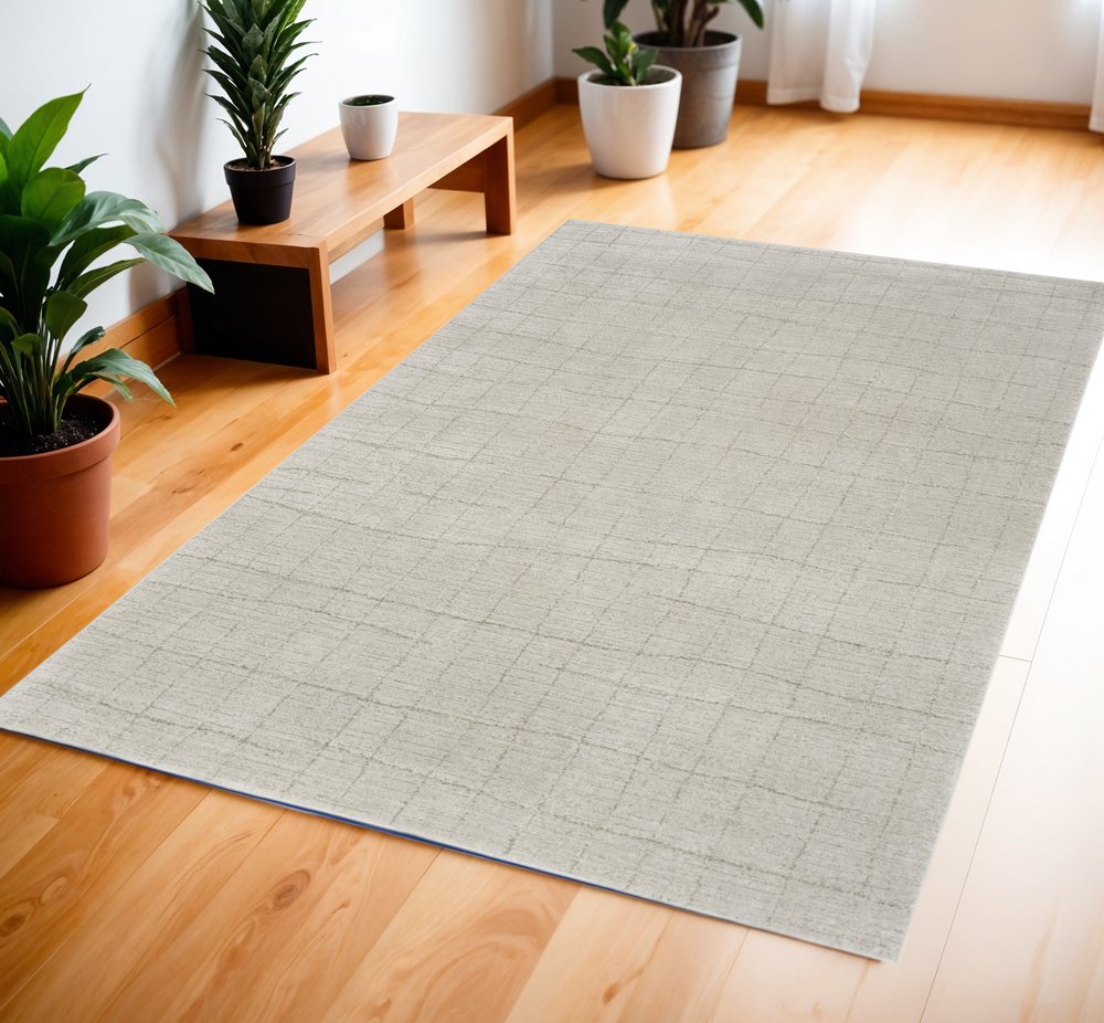 4' X 6' Beige and Gray Abstract Power Loom Area Rug