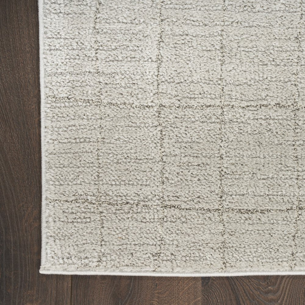 4' X 6' Beige and Gray Abstract Power Loom Area Rug