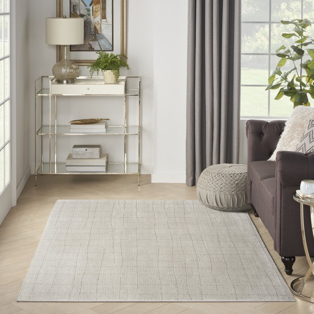 4' X 6' Beige and Gray Abstract Power Loom Area Rug