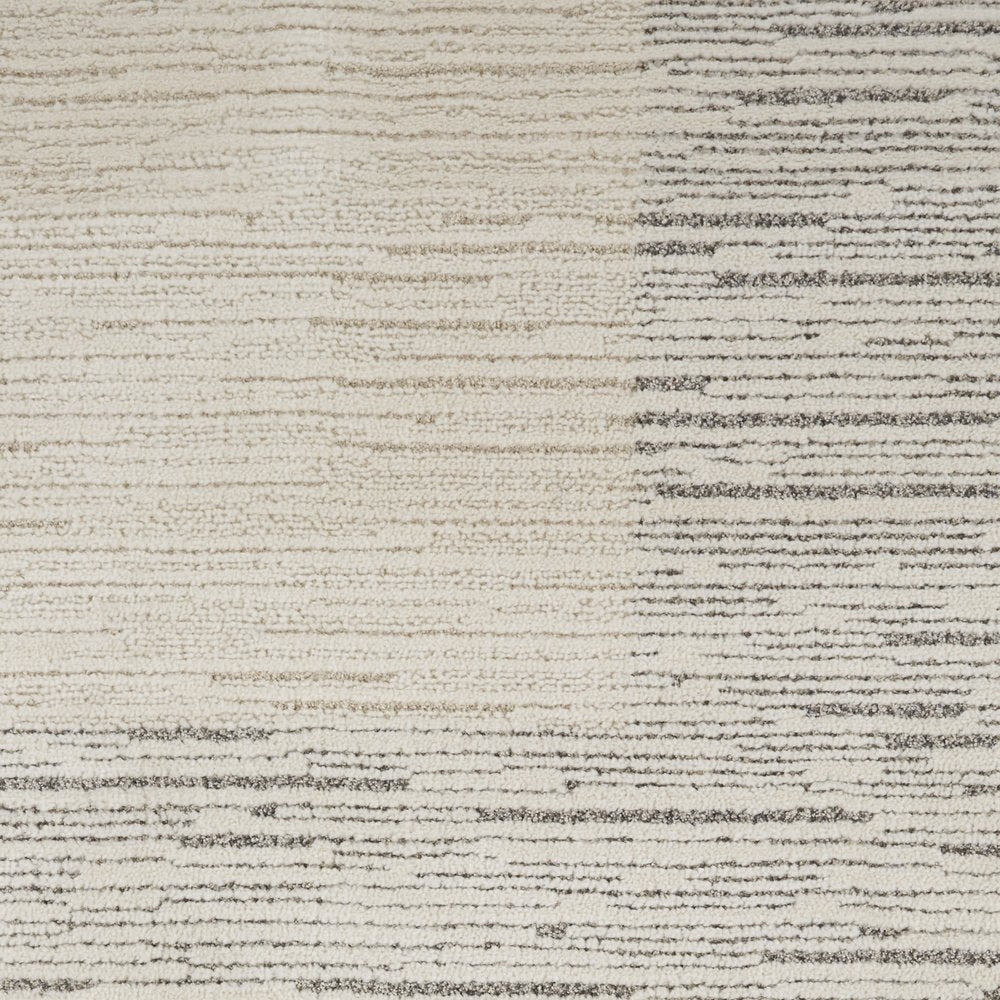 8' X 10' Ivory and Gray Abstract Power Loom Area Rug