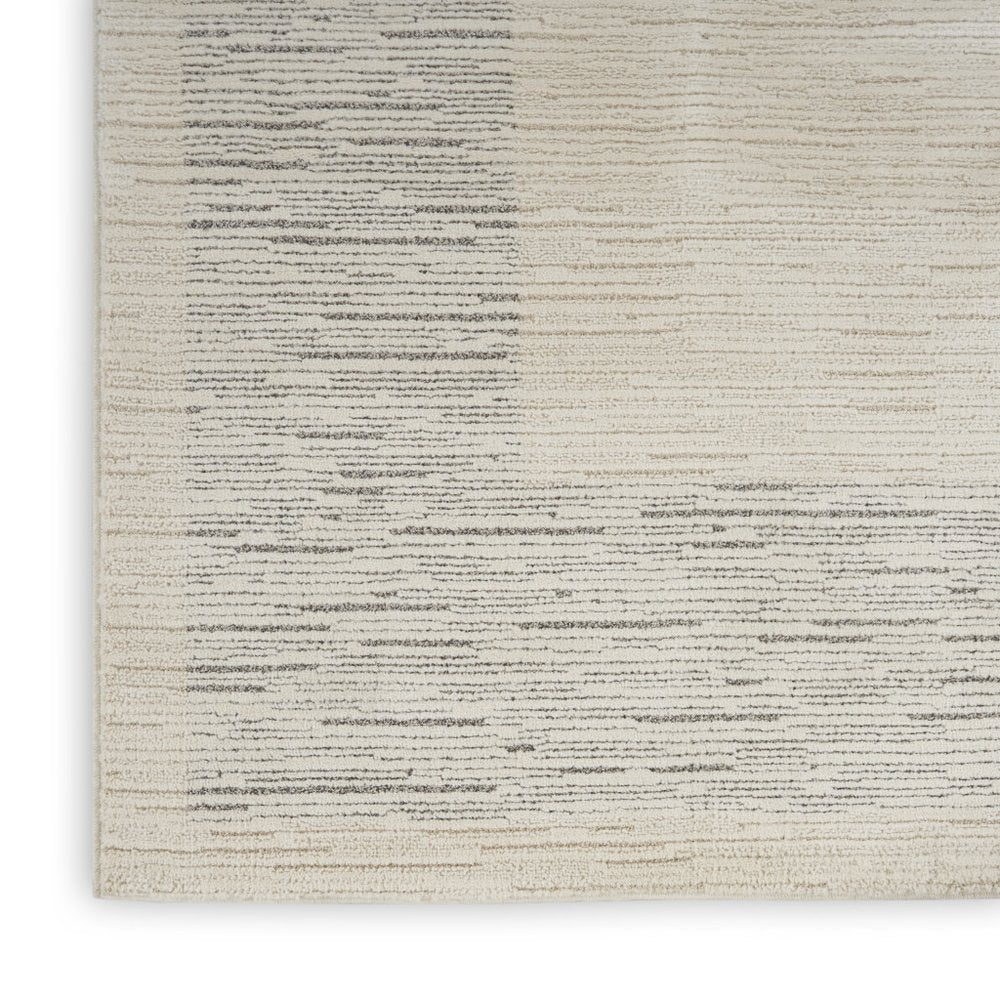 8' X 10' Ivory and Gray Abstract Power Loom Area Rug