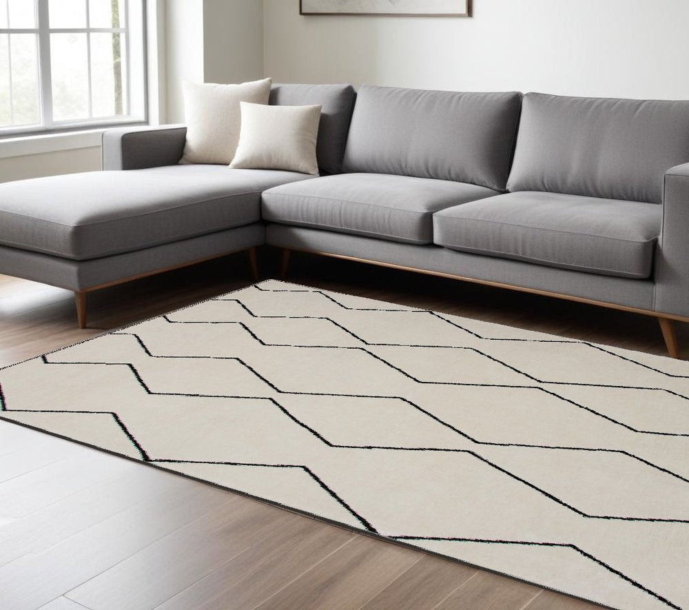 7' X 10' Beige and Black Geometric Power Loom Distressed Non Skid Area Rug