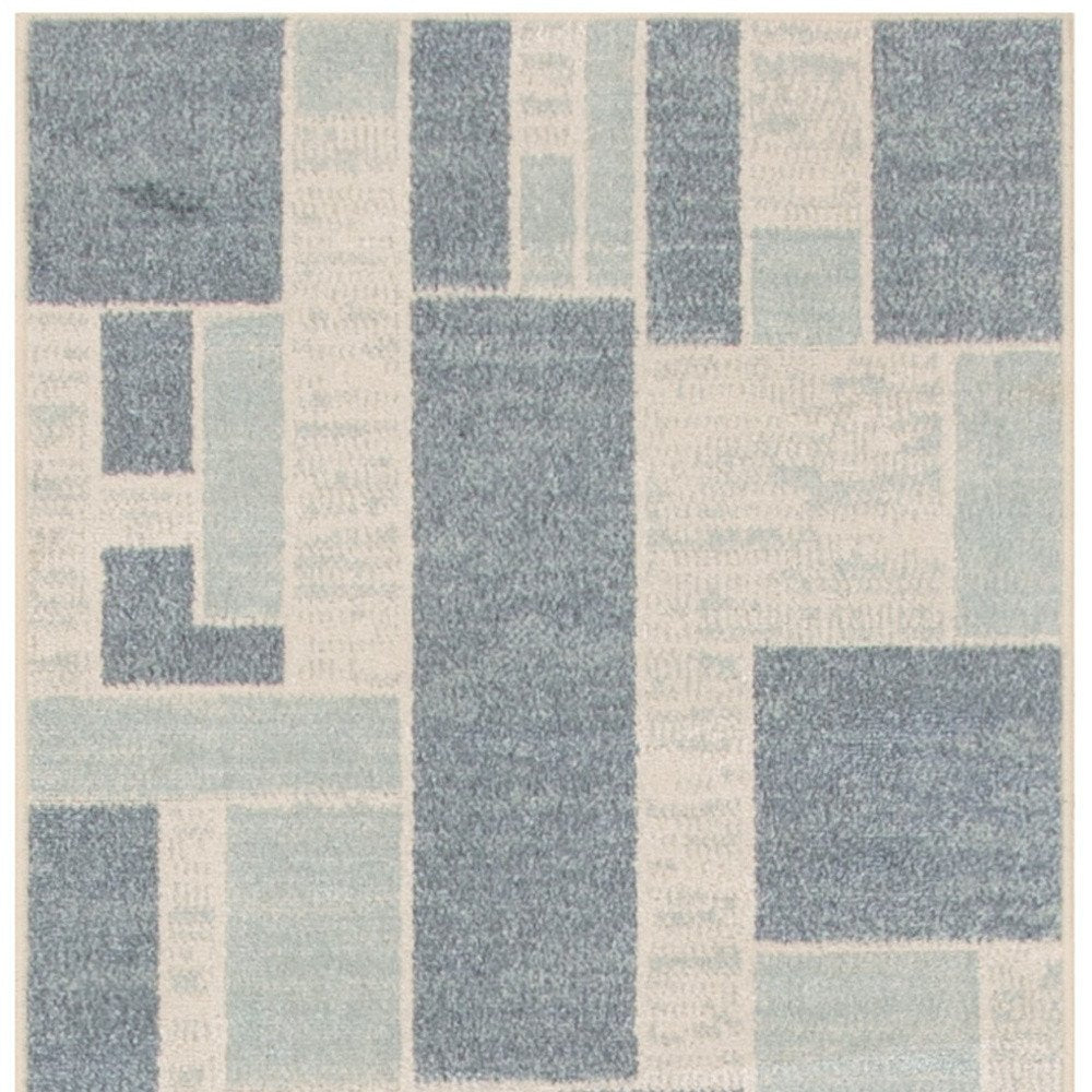 8' Blue And Ivory Geometric Washable Runner Rug