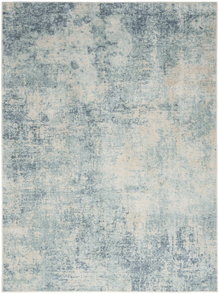4' X 6' Blue and Ivory Abstract Power Loom Washable Area Rug