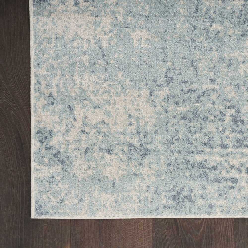 9' X 12' Blue and Ivory Abstract Power Loom Washable Area Rug