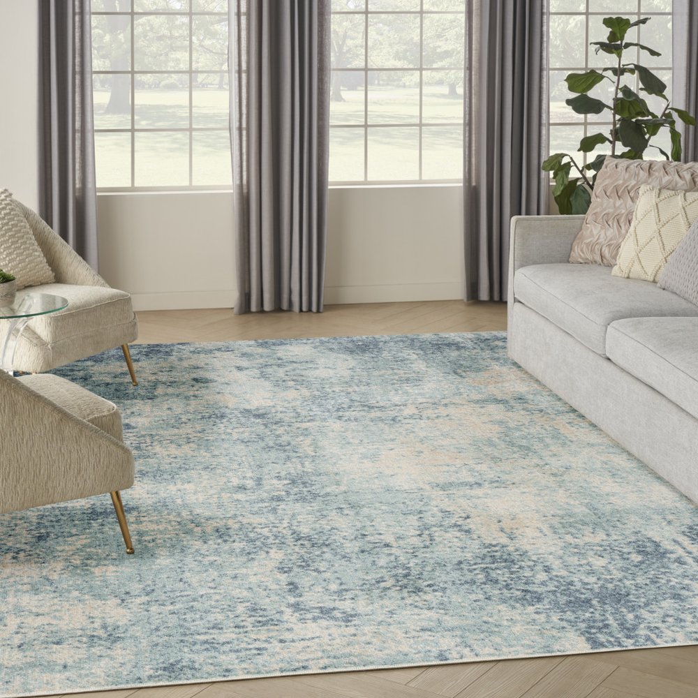 9' X 12' Blue and Ivory Abstract Power Loom Washable Area Rug