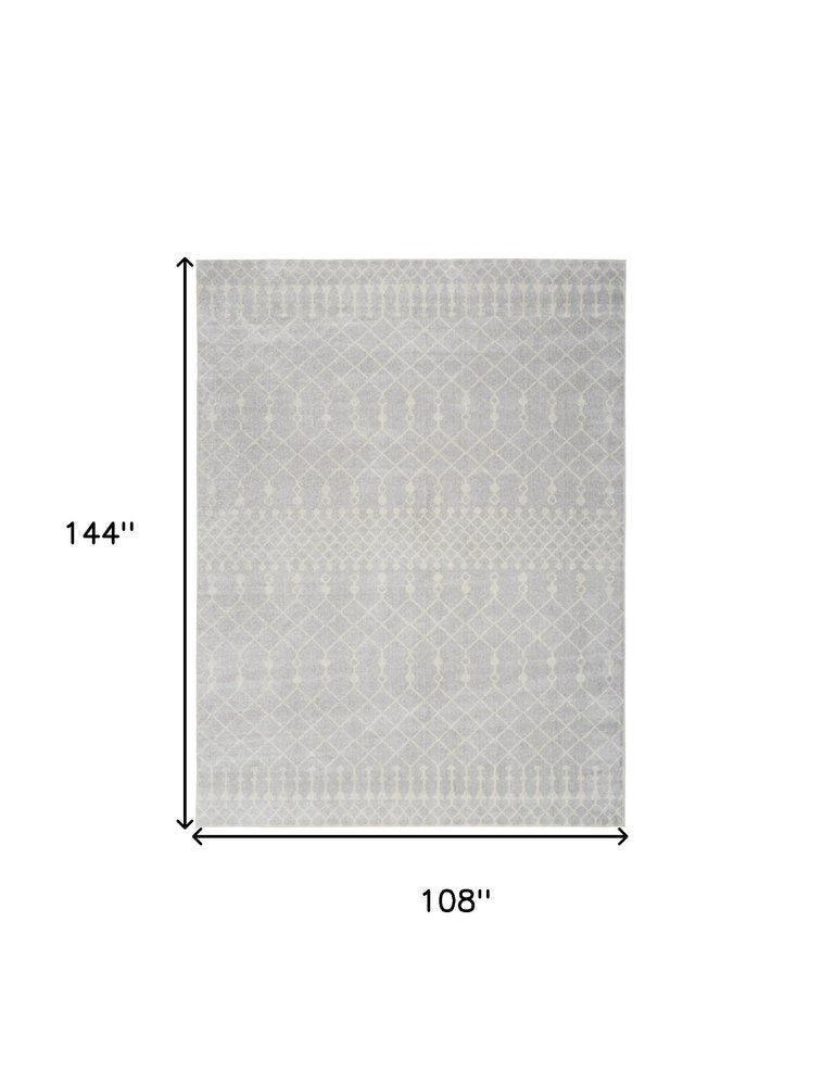 9' X 12' Blue and Ivory Abstract Power Loom Washable Area Rug